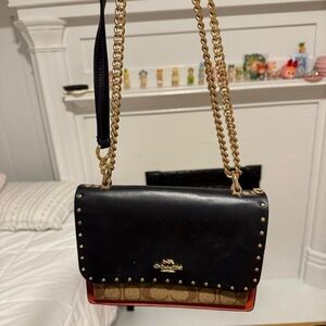 Coach Black and Tan Crossbody Bag with Gold Chain Strap